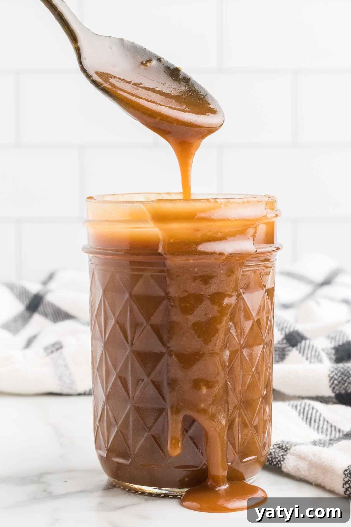 Butterscotch sauce in a jar.