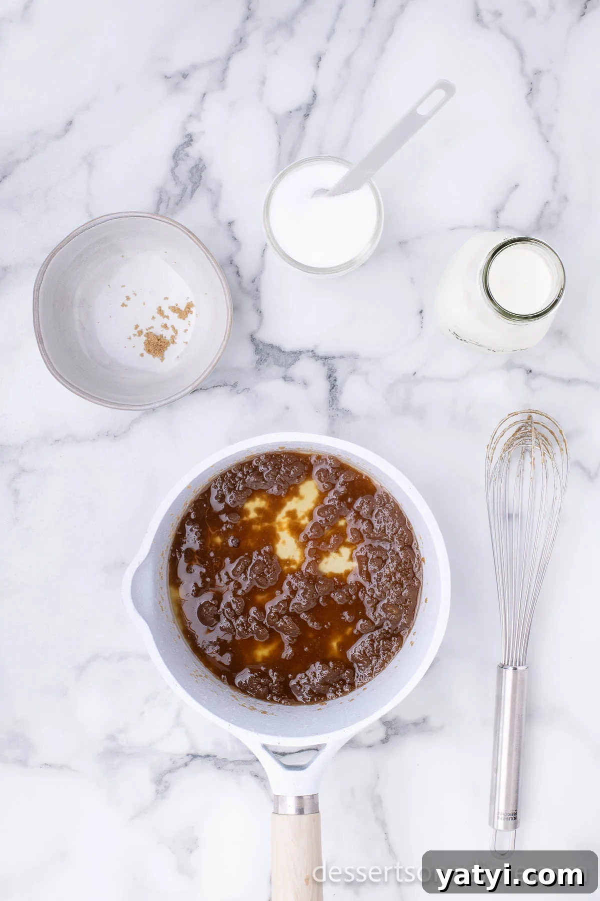 Saucepan with butter and cream.