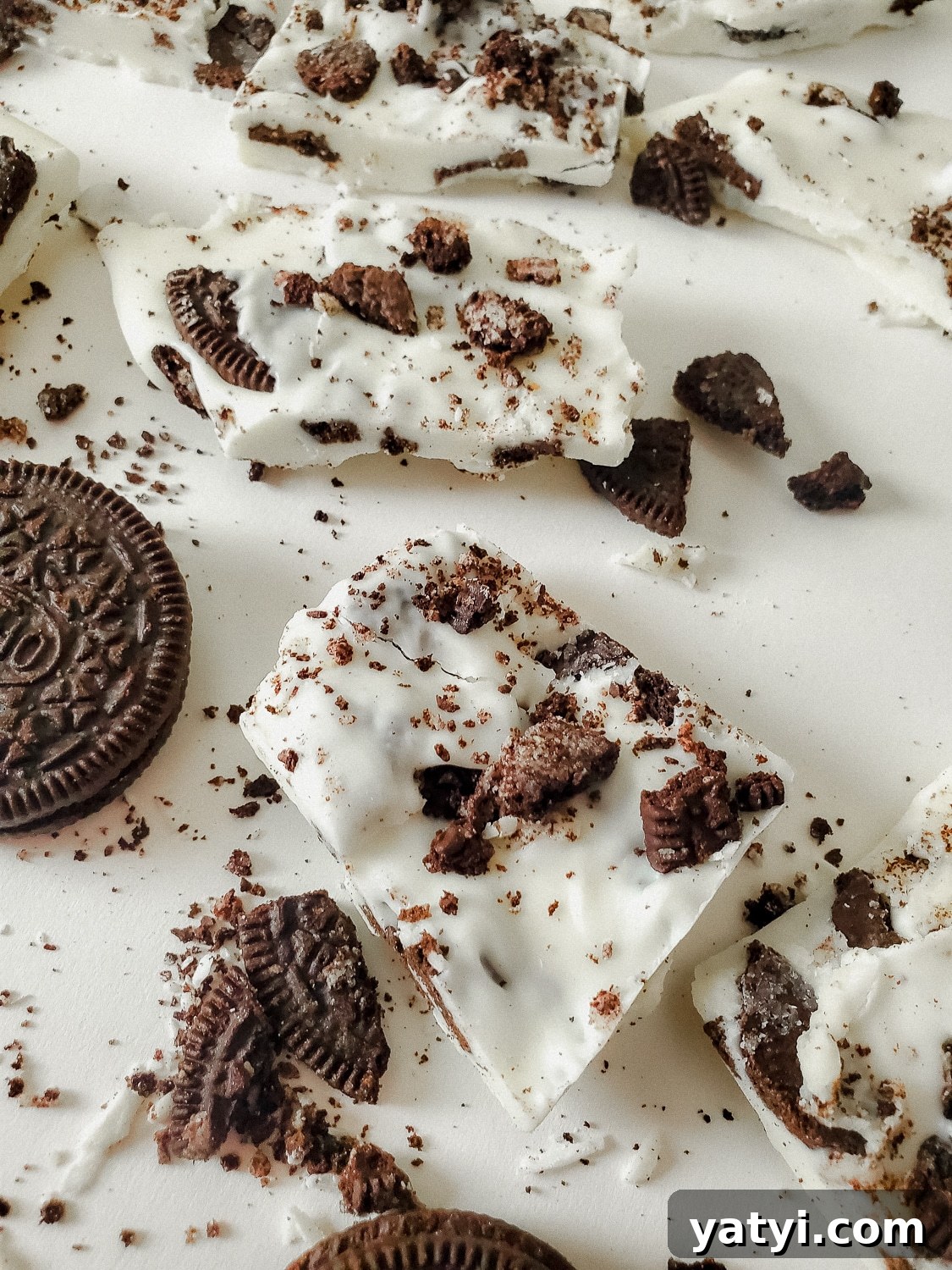 close up shot of oreo cookies and cream bark in pieces 