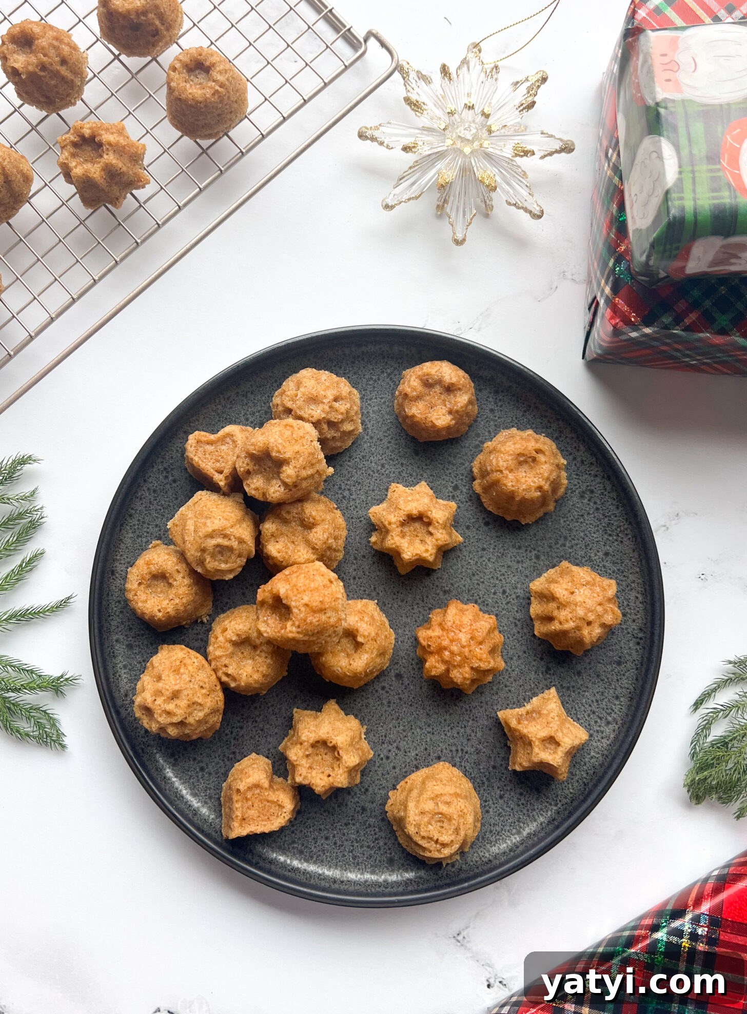 Holiday Cardamom Tea Cakes—Festive Spiced Cake Recipe (Video) 5 Cardamom tea cakes dusted without powdered sugar