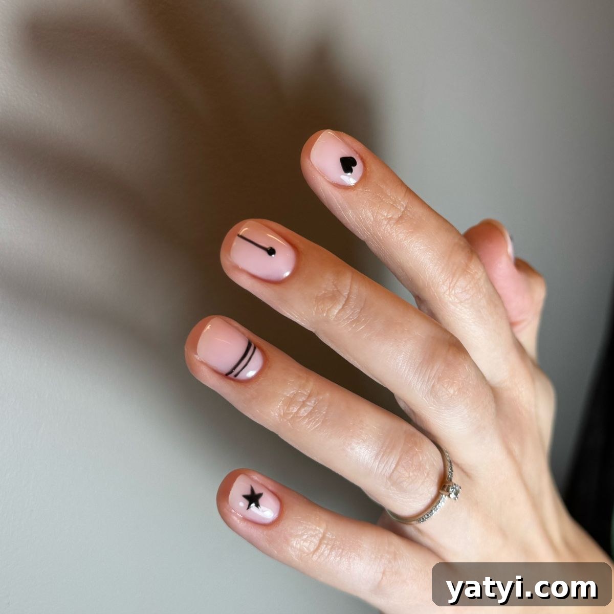 41 Chic Nude Nail Ideas You Can Create at Home 33 31. Eye-Catching Designs
