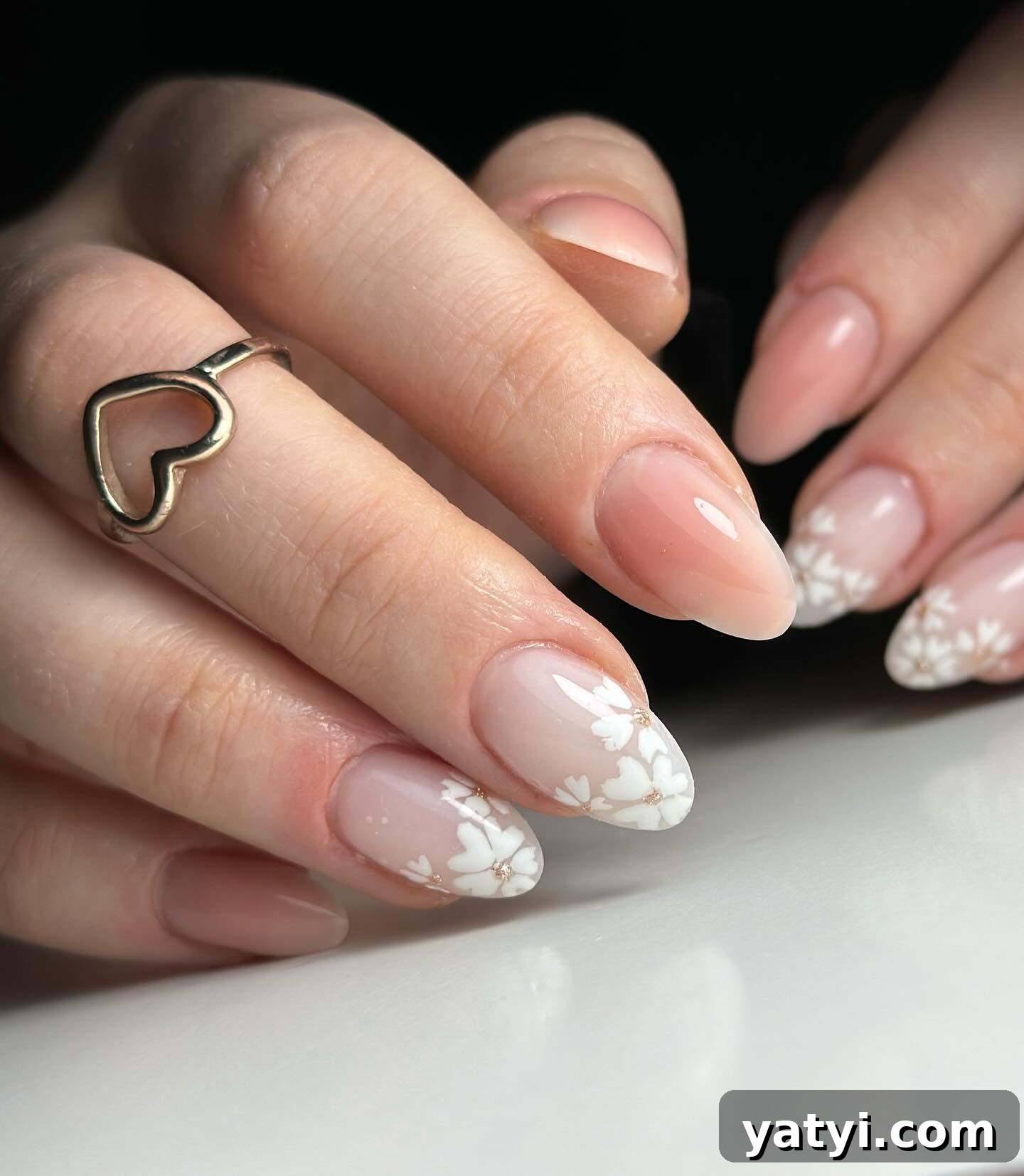 41 Chic Nude Nail Ideas You Can Create at Home 36 34. Nude Nails with White Flowers