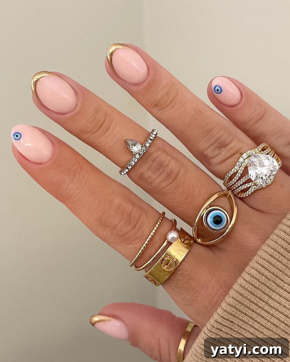 41 Chic Nude Nail Ideas You Can Create at Home 37 35. Evil Eye Nails