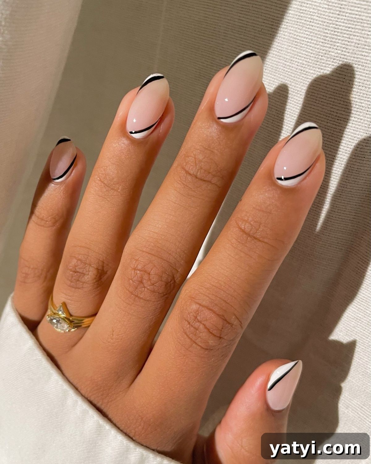 41 Chic Nude Nail Ideas You Can Create at Home 9 7. Black, White, and Nude