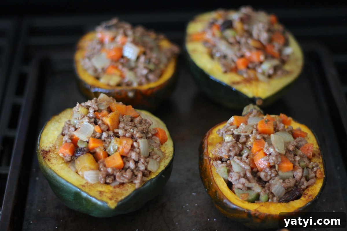 Paleo Moroccan Lamb Stuffed Squash (AIP) - tender roasted squash is stuffed with a sweet and savory lamb and fruit filling for an exotic, yet easy main course! | fedandfulfilled.com
