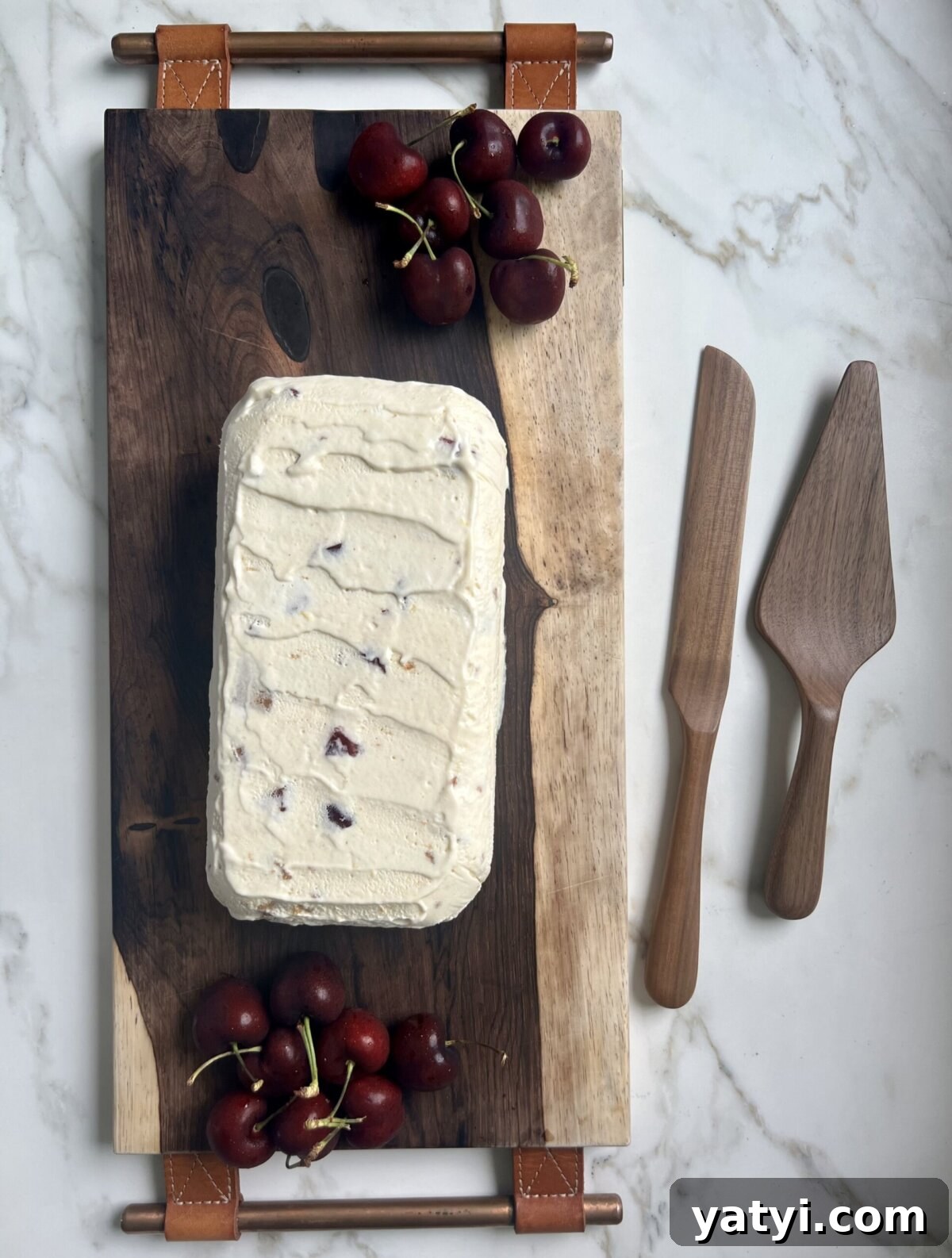 Semifreddo with Crushed Biscotti and Cherry Swirl 5 an Italian semifreddo recipe on a cutting board