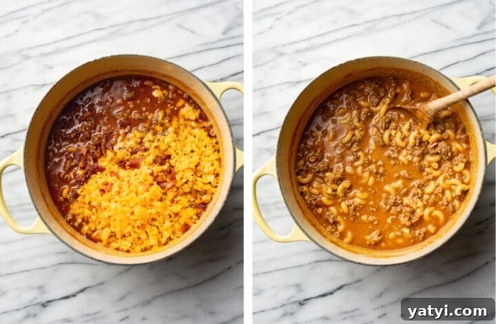 One-Pot Cheeseburger Macaroni Recipe for Quick Family Dinners 5 adding cheddar cheese into a pot of cheeseburger macaroni