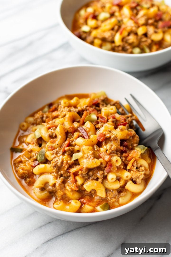 One-Pot Cheeseburger Macaroni Recipe for Quick Family Dinners 7 two white bowls with cheeseburger pasta