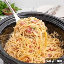 Creamy Slow Cooker Chicken Spaghetti Recipe for Weeknight Meals 9 a Slow Cooker of Chicken Spaghetti