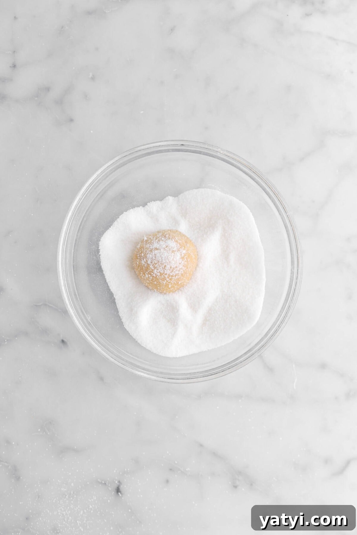 cookie dough ball coated in sugar.