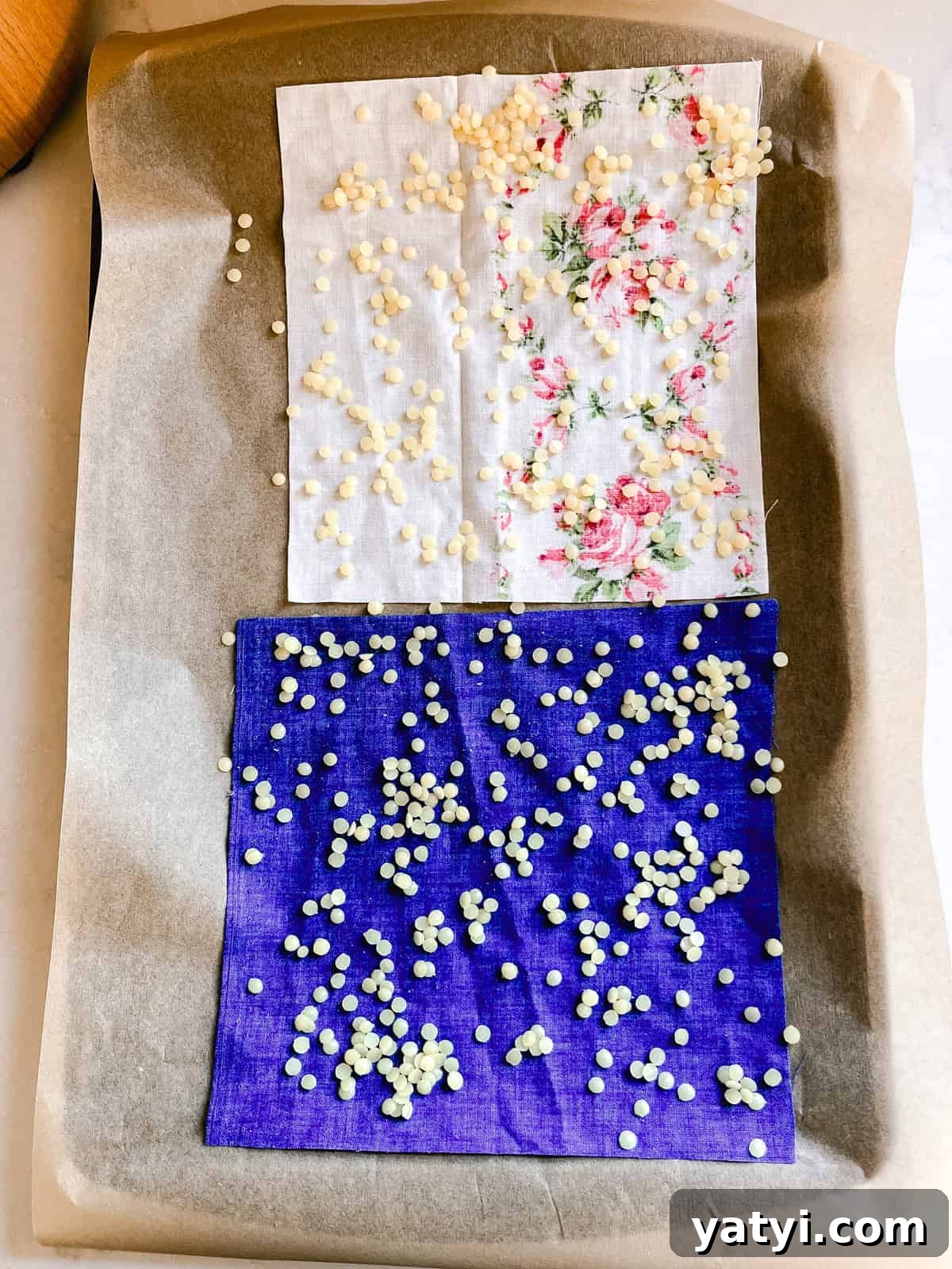 Make Beeswax Food Wraps at Home: Step-by-Step Guide 6 Beeswax pellets scattered over the fabric squares.