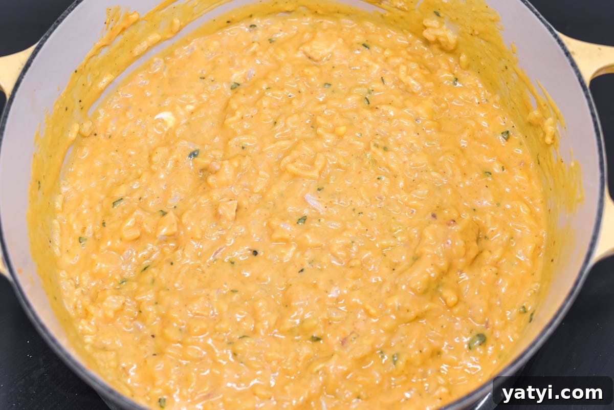 Creamy Chicken and Pumpkin Risotto Recipe for Fall Nights 9 Chicken and pumpkin risotto in Dutch oven.