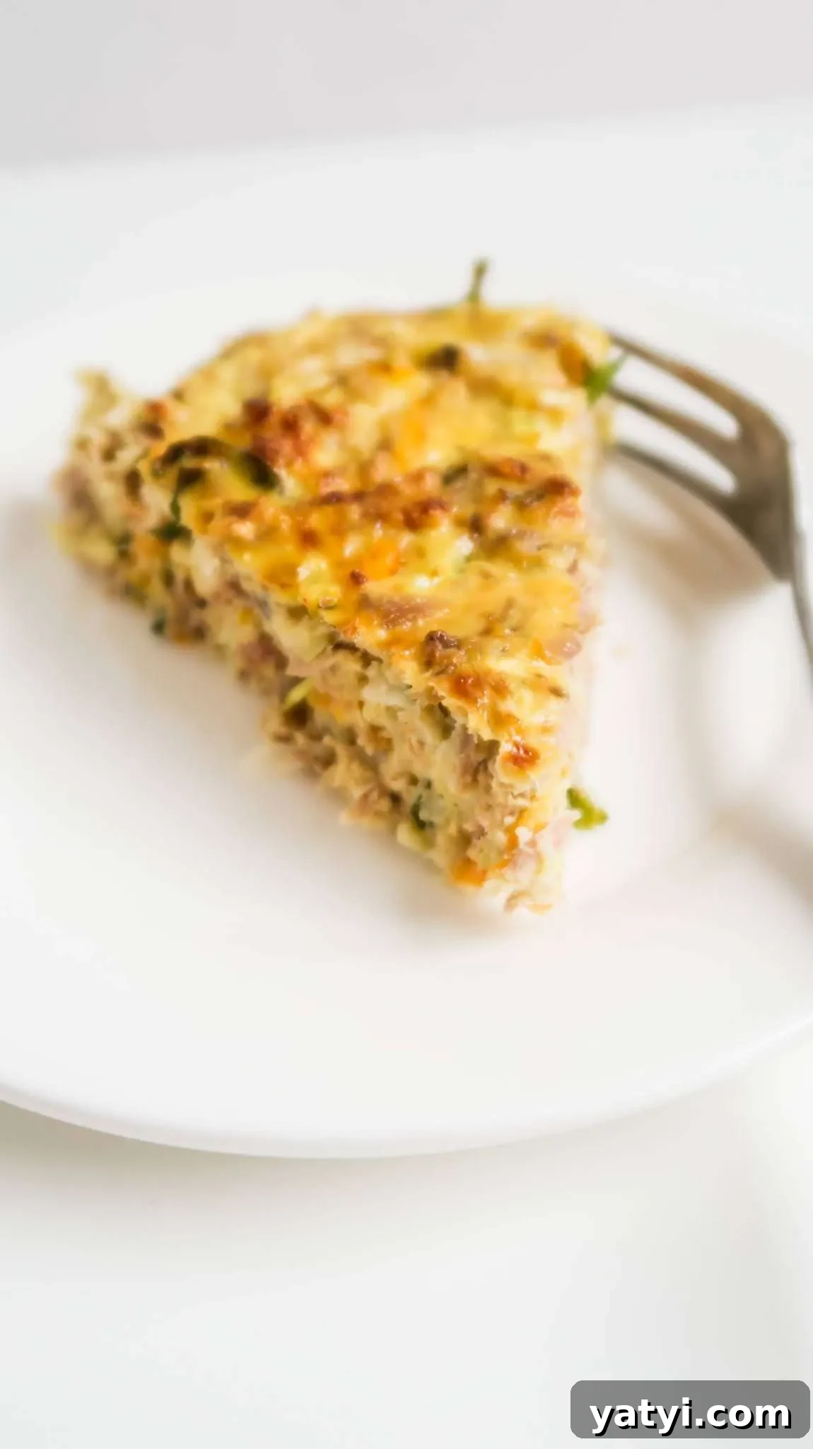 This crustless tuna breakfast quiche recipe is healthy, so easy to make and the perfect meal prep breakfast recipe. This quick and healthy savory breakfast idea is gluten free and also easily made low carb and dairy-free. Perfect easy canned tuna recipe and great for clean eating too!