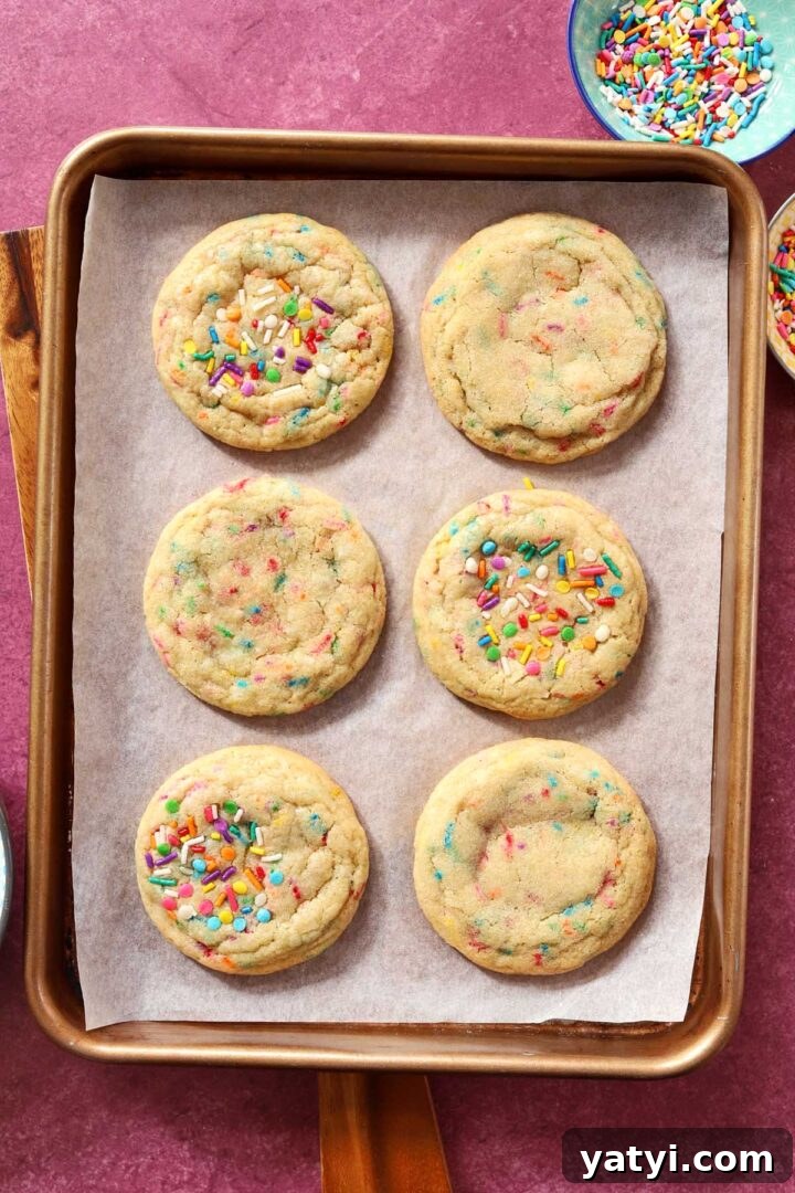 Soft Sprinkle Sugar Cookies Recipe for Perfectly Tender Cookies 8 sprinkle sugar cookies after baking on baking sheet