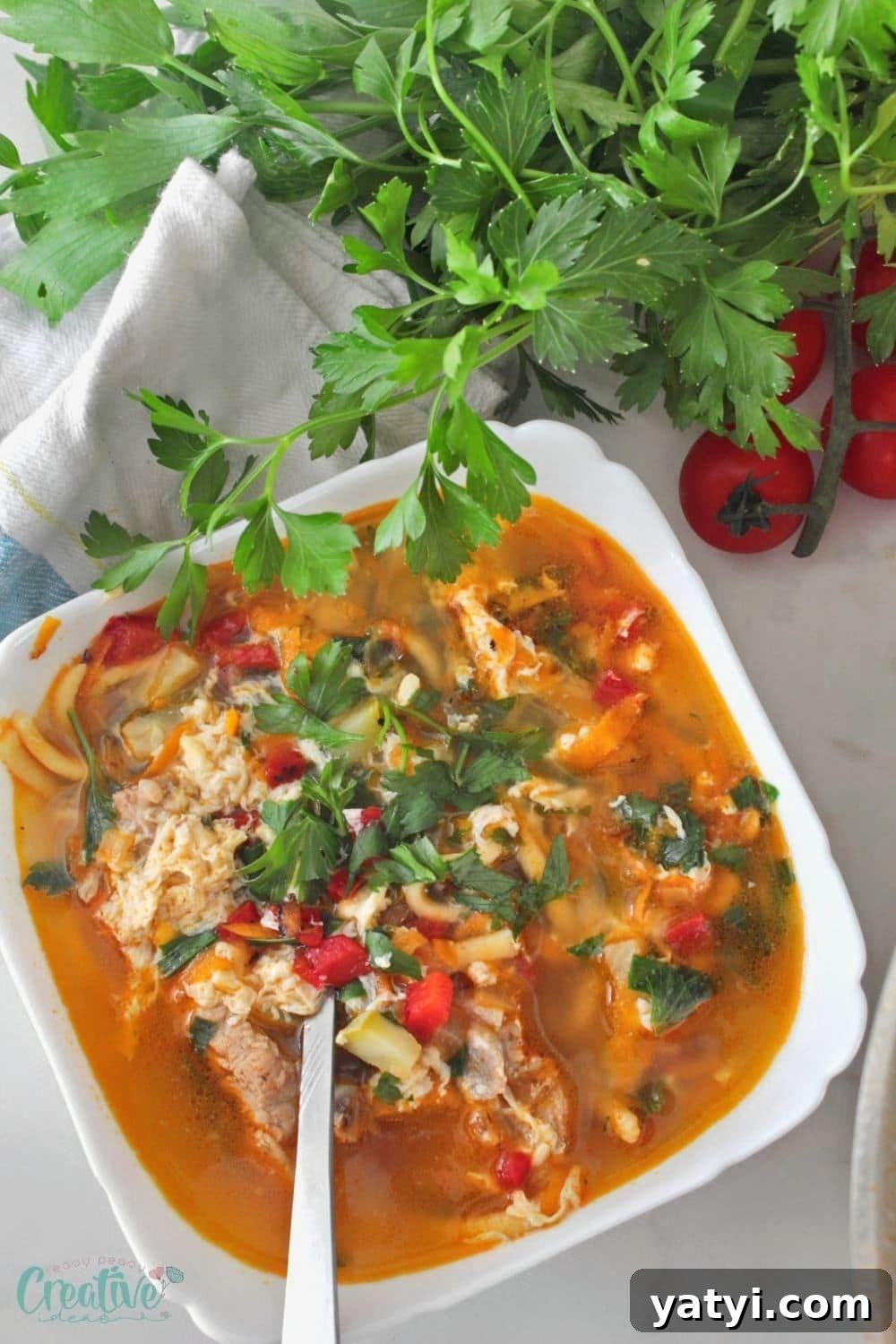 Savory Pork Rib Soup with Egg Noodles and Aromatic Broth 3 Pork rib noodle soup served in a white soup bowl