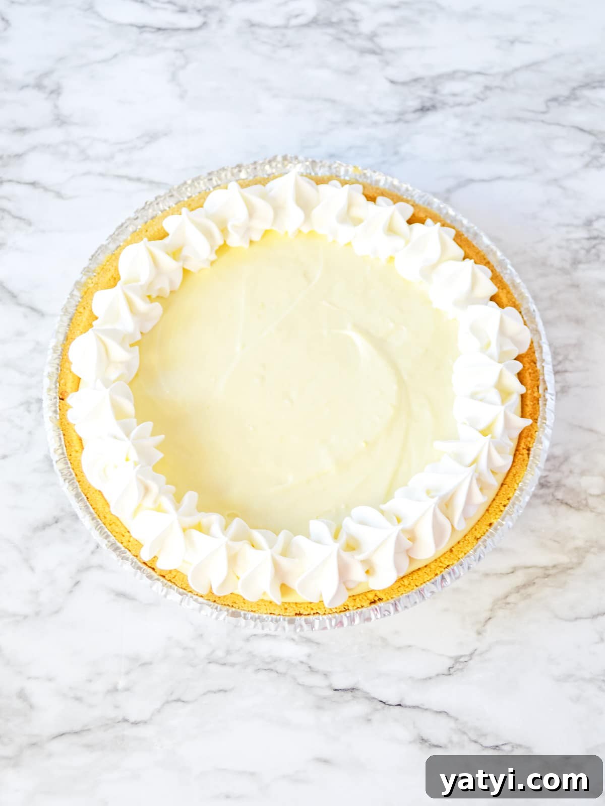 Zesty Lemon Pie with Graham Cracker Crust Recipe 6 add whipped cream to lemon pie before serving