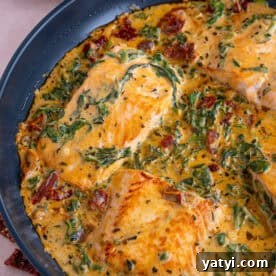 A pan of creamy Tuscan salmon.