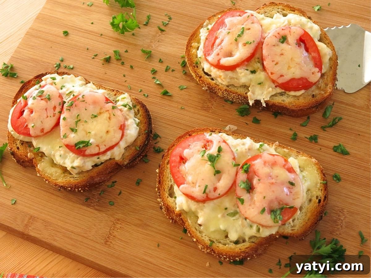 10 Quick Weeknight Dinners to Save Your Evenings 3 Three open-faced creamy tuna melts with cream cheese on a serving board.