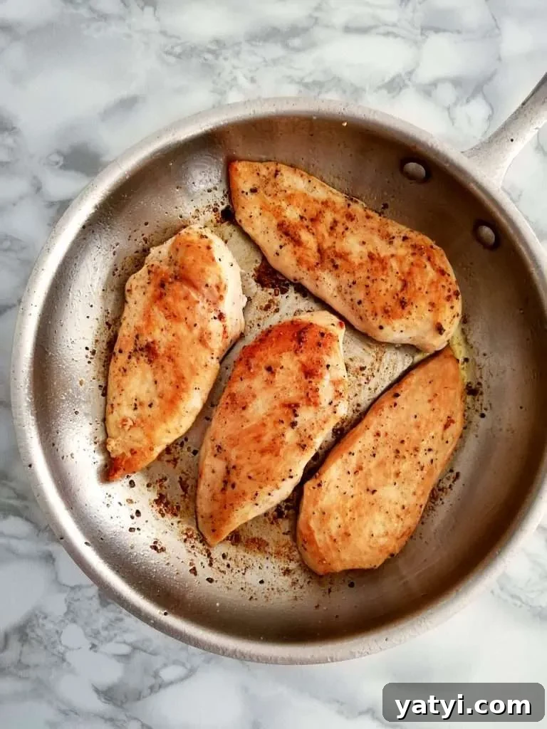 Chicken in Creamy White Wine Sauce: Simple Weeknight Dinner 6 chicken with white wine sauce chicken cooked in skillet