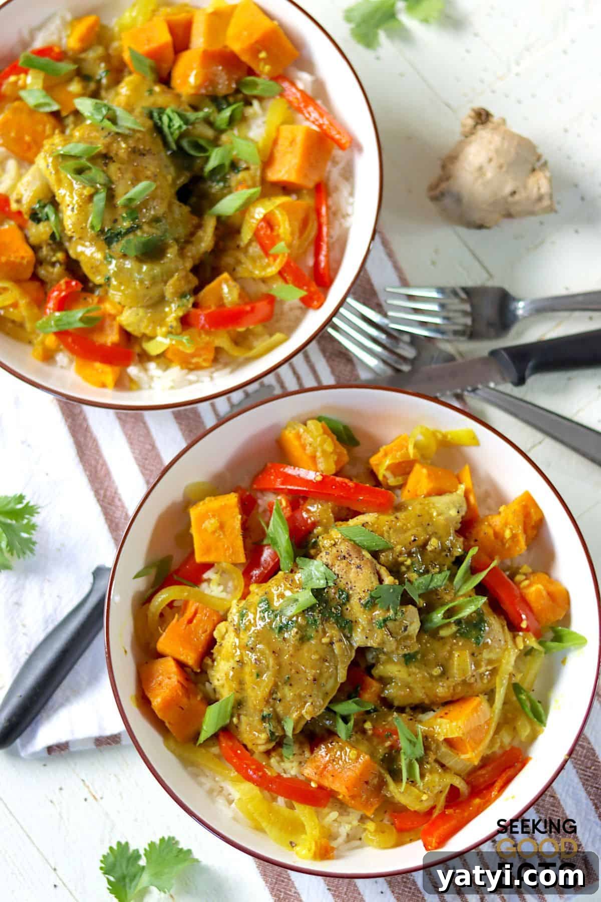 Low-Effort Crockpot Chicken Curry with Bold Flavor 4 Chicken curry served in two bowls.