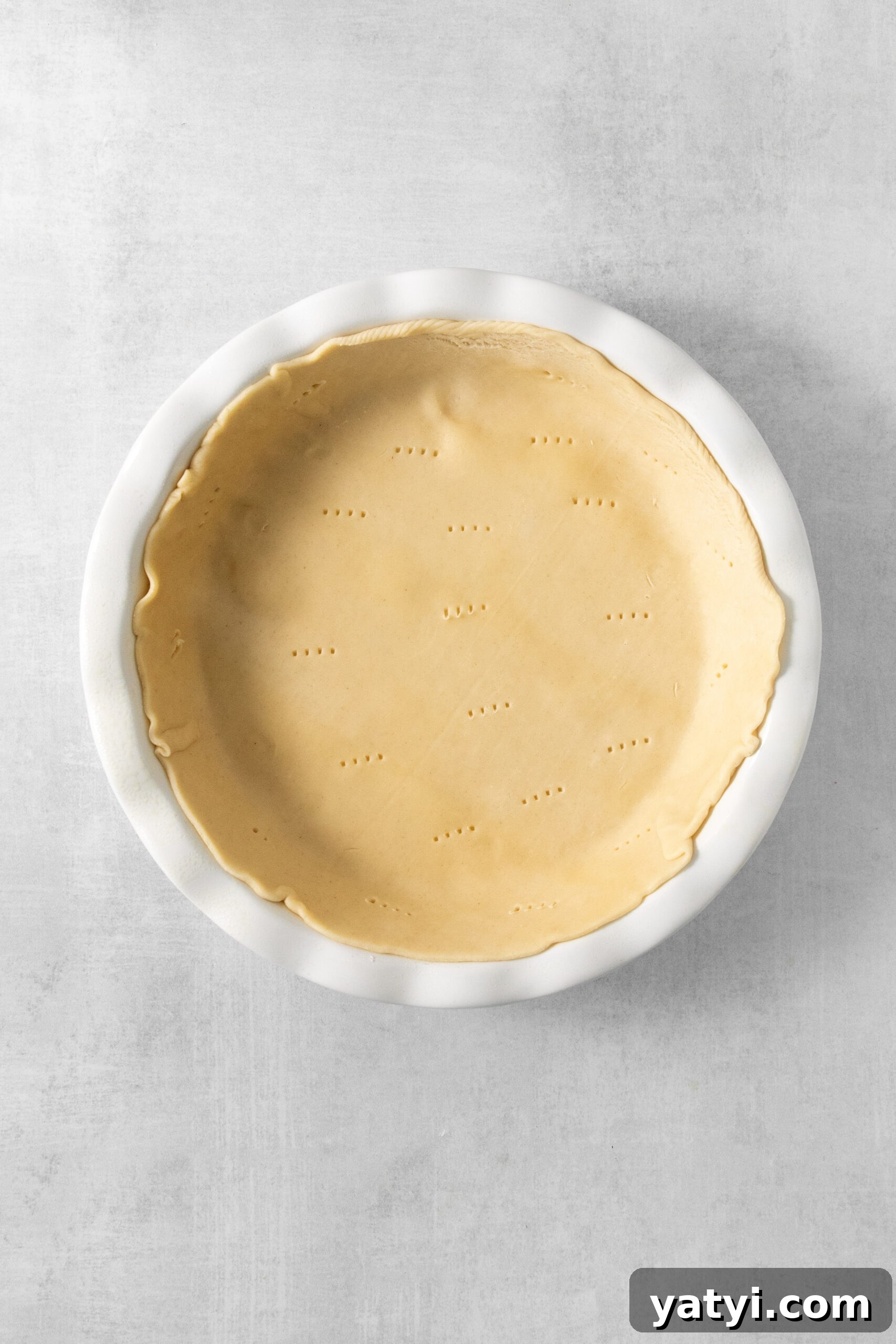 Classic Peach Pie Recipe Using Canned Peaches 7 raw pie dough in a pie pan
