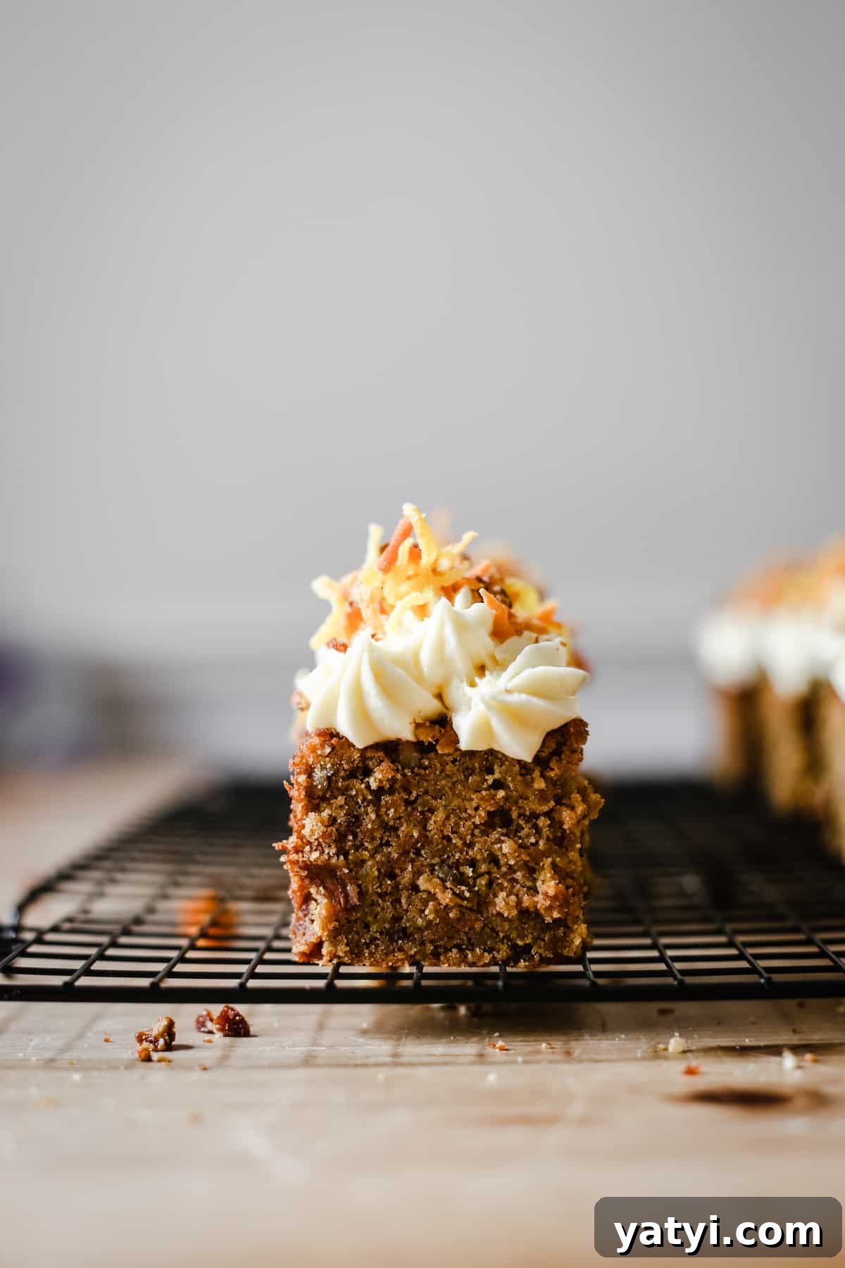 Gluten-Free Golden Beet and Carrot Cake Recipe 8 A close up of a slice of cake on a wire rack