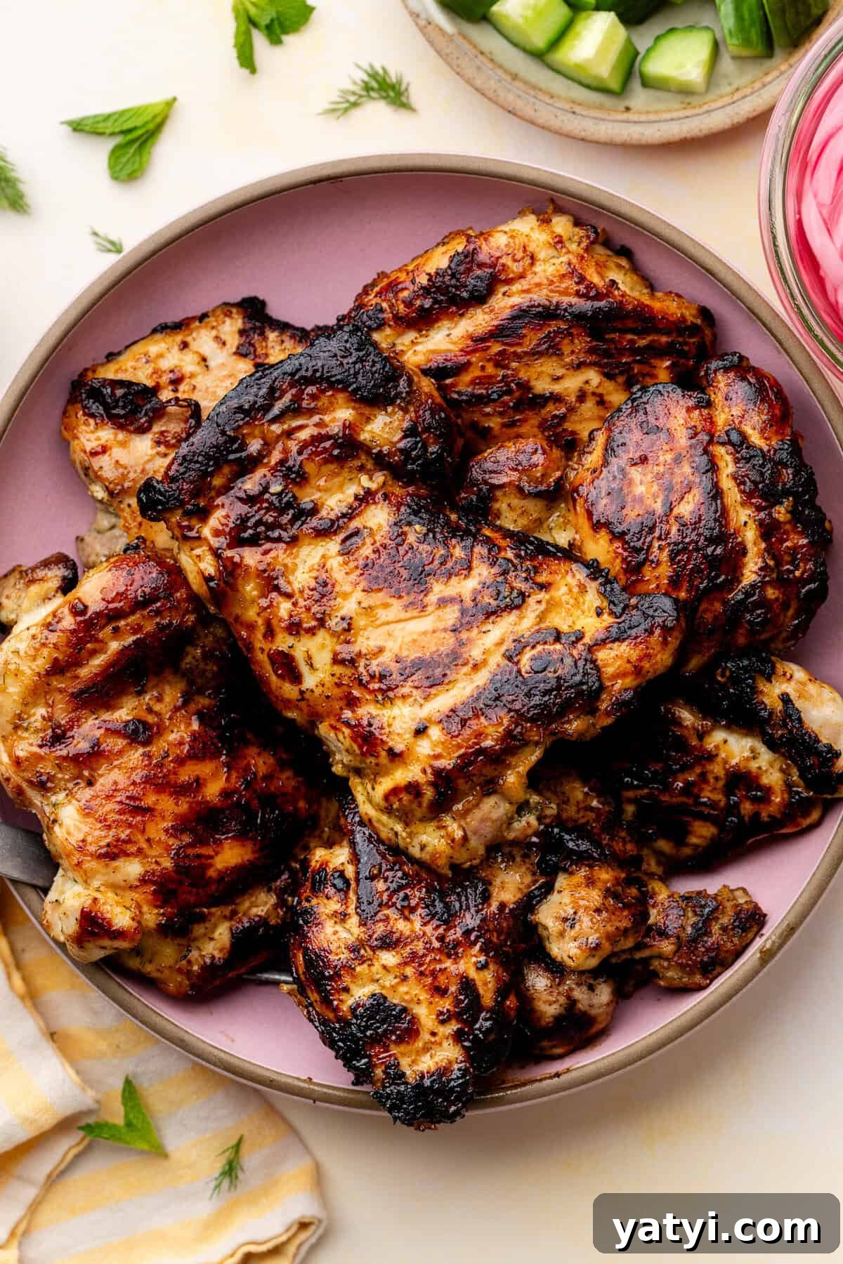 grilled chicken thighs on plate