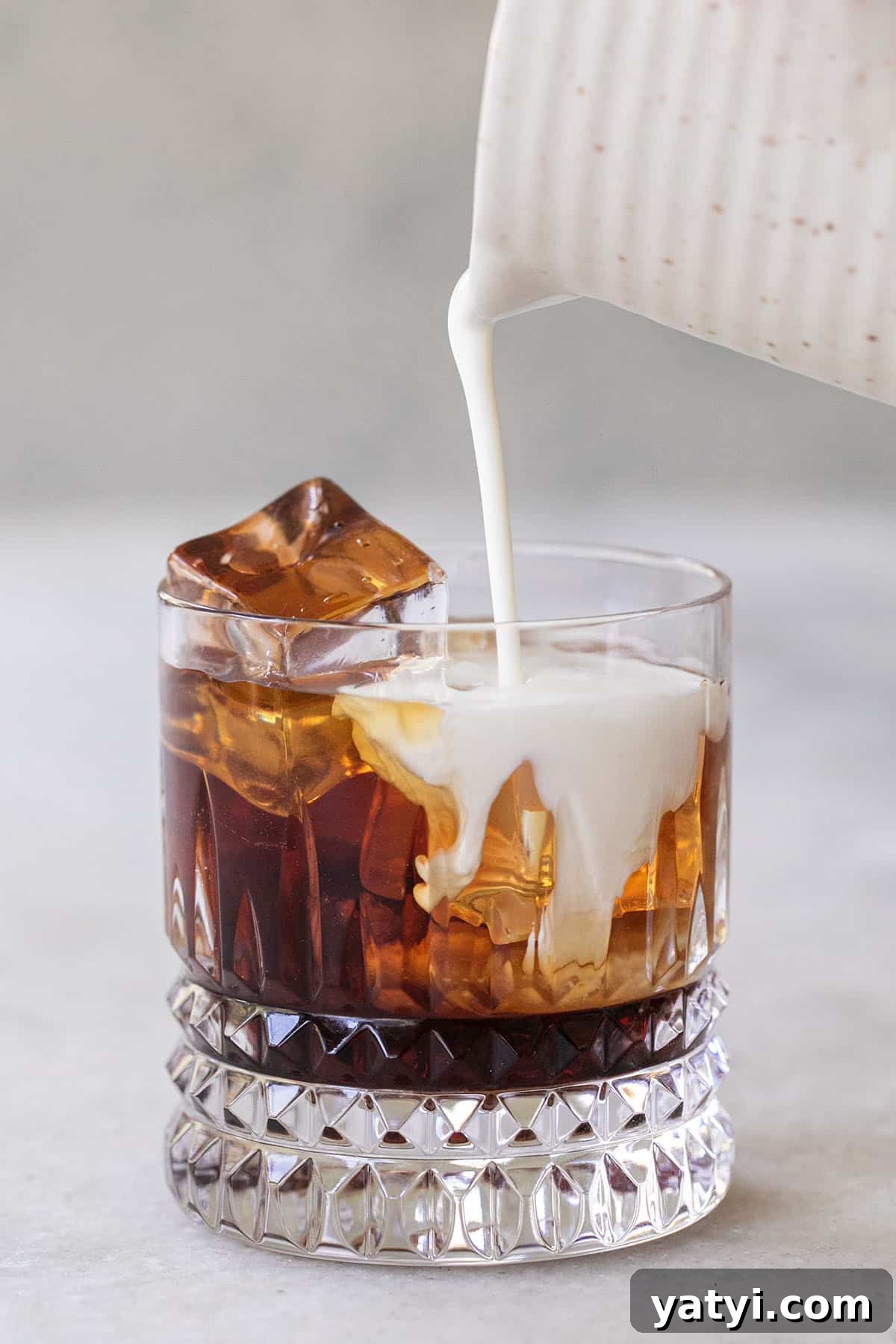 Creamy Whipped White Russian Cocktail Recipe 5 cream over kahlua and vodka