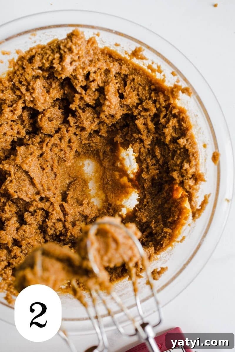 Gluten-Free Pumpkin Chocolate Chip Blondies You’ll Love 5 Pumpkin blondie batter in a bowl.