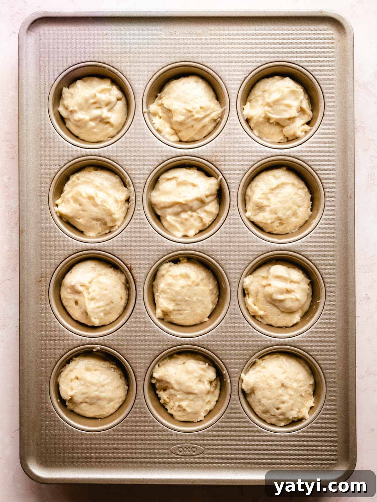 Cinnamon Sugar Donut Muffins Recipe — Soft Baked Donut-Style Muffins 5 muffin batter in cupcake tin