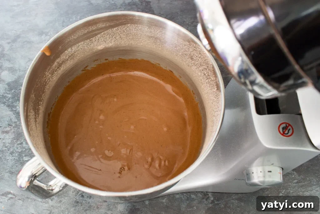 Bonfire Cupcakes Recipe: How to Make Campfire-Style Treats 6 Chocolate cupcake batter in the bowl of an electric stand mixer.