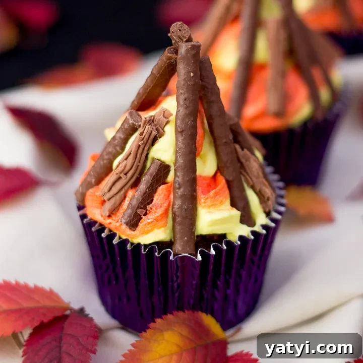 A bonfire cupcake in a purple cupcake case.