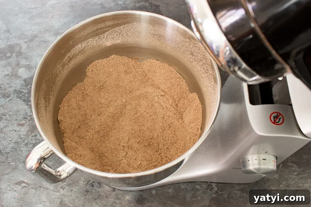 Bonfire Cupcakes Recipe: How to Make Campfire-Style Treats 5 Dry chocolate cupcake ingredients mixed together in an electric stand mixer.