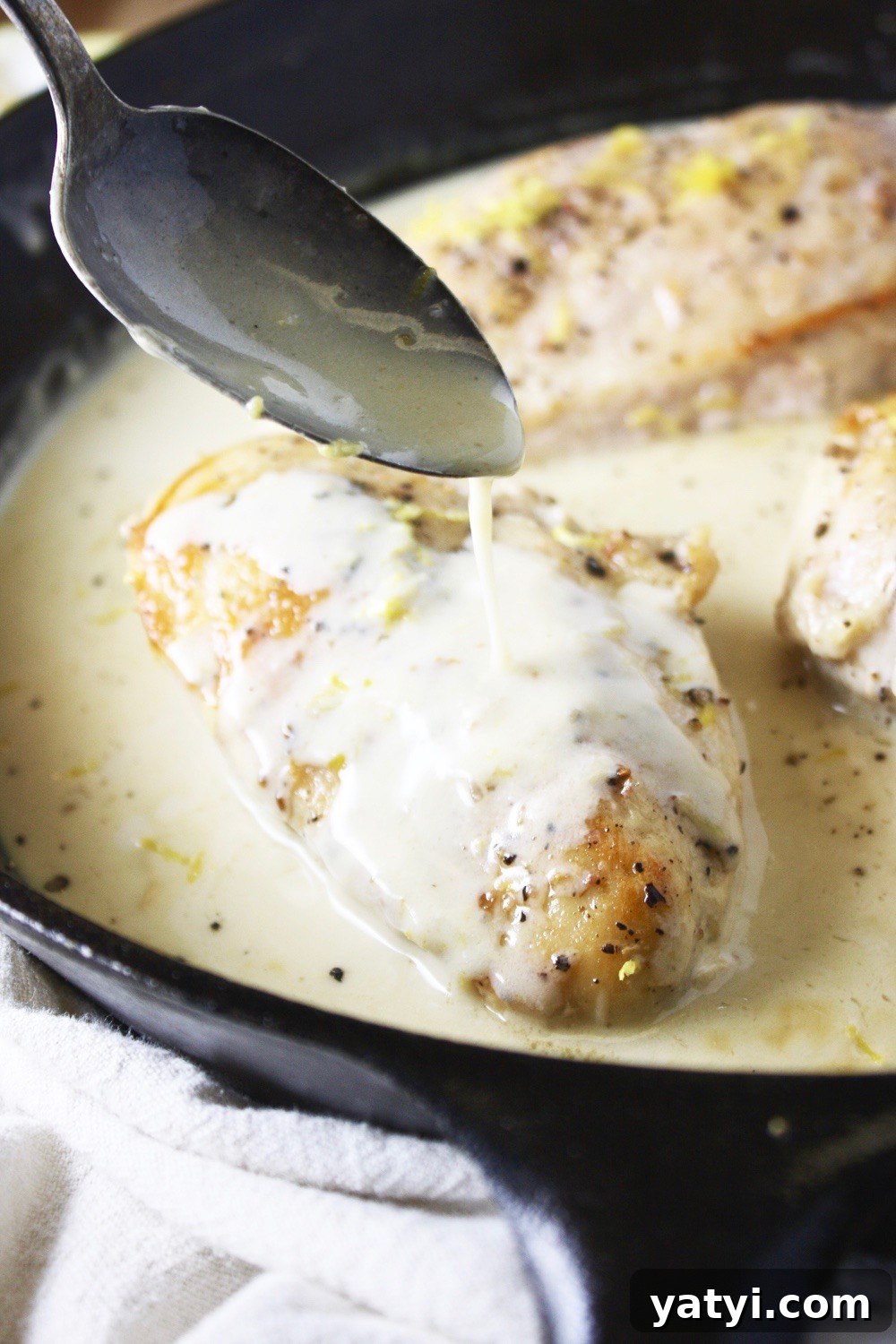 One Pan Lemon Coconut Chicken! This recipe takes literally 3 ingredients and 20 minutes to make! It couldn’t get any easier than this, and the flavor is outstanding! I love serving this over rice. TheGarlicDiaries.com
