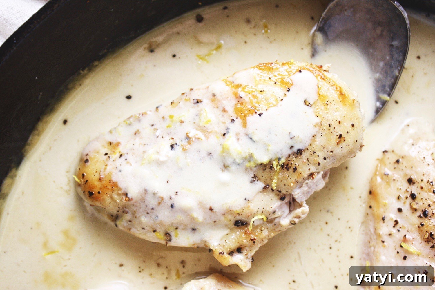 One Pan Lemon Coconut Chicken! This recipe takes literally 3 ingredients and 20 minutes to make! It couldn’t get any easier than this, and the flavor is outstanding! I love serving this over rice. TheGarlicDiaries.com