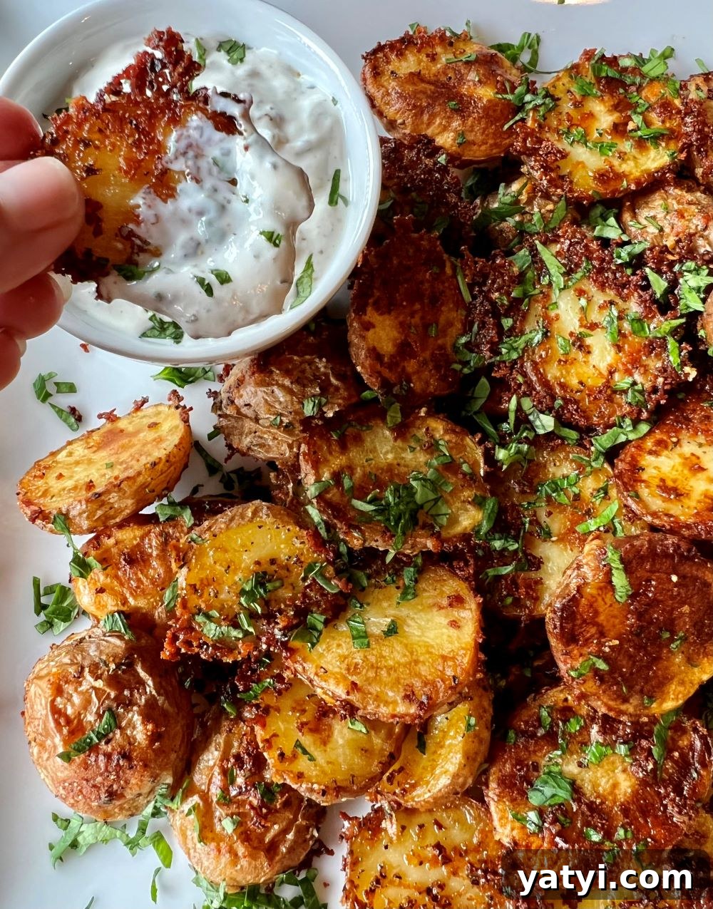 Crispy Parmesan Ranch Roasted Potatoes 3 Roasted potatoes on a baking sheet