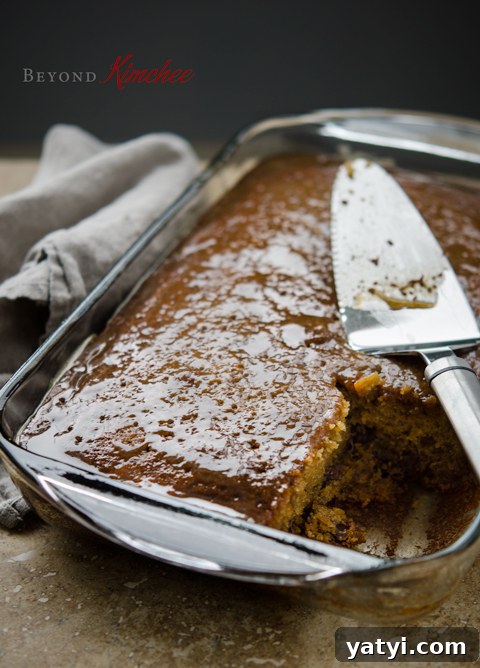 Sticky Date Pudding Cake Recipe with Toffee Sauce 3 Sticky warm caramel sauce is poured on date pudding cake
