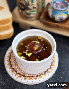 Instant Bread Gulab Jamun Recipe — Soft, No-Yeast Indian Dessert 4 Delicious bread-based Gulab Jamun served in sweet syrup, perfect for quick dessert cravings.