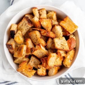Crispy Sourdough Croutons: How to Make and Store Them Perfectly 10 A bowl full of homemade croutons.