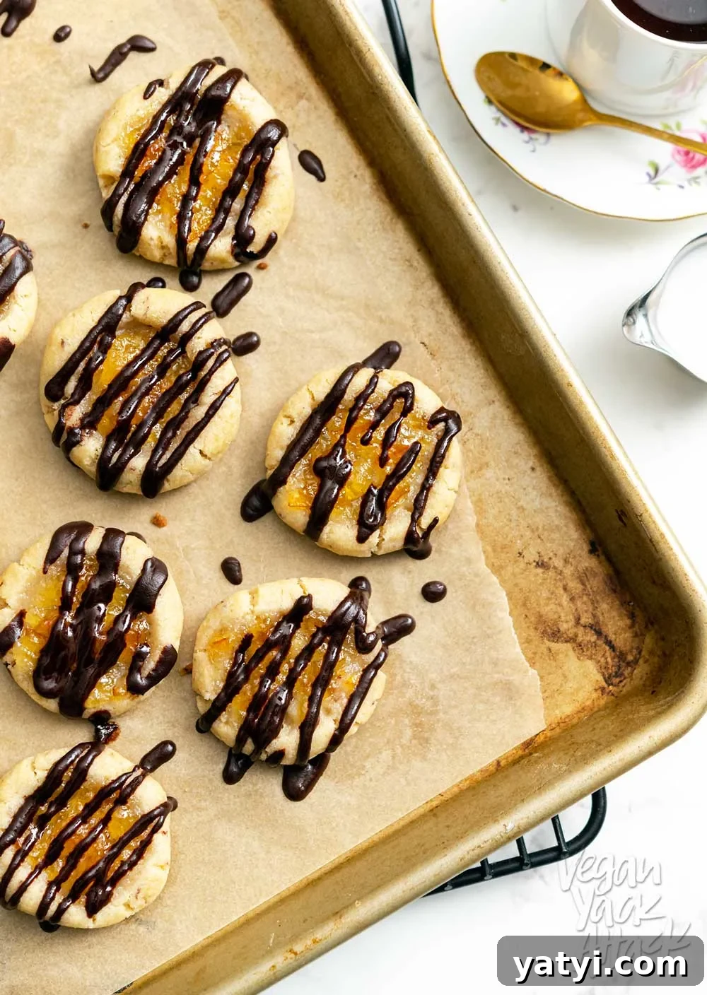 Vegan Holiday Afternoon Tea Menu & Festive Recipes 4 Close up of vegan orange marmalade cookies with chocolate drizzle