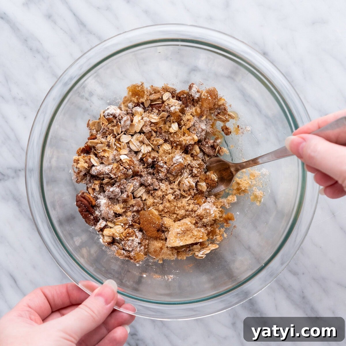 Cinnamon-Stuffed Baked Apples Made in the Air Fryer 8 mixing baked apple filling in a bowl