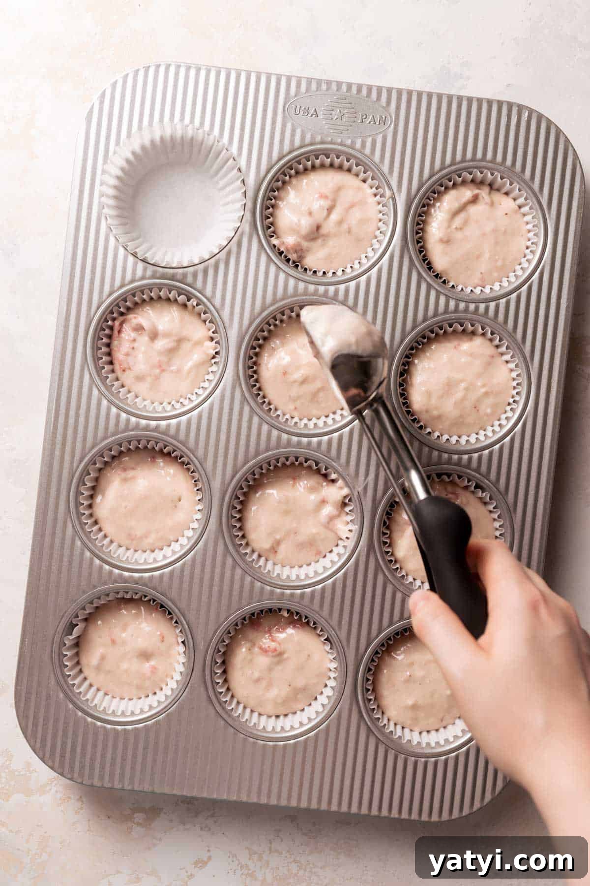 Strawberry Crunch Cupcakes Recipe with Crispy Topping 8 filling cupcake liners with the strawberry cupcake batter.