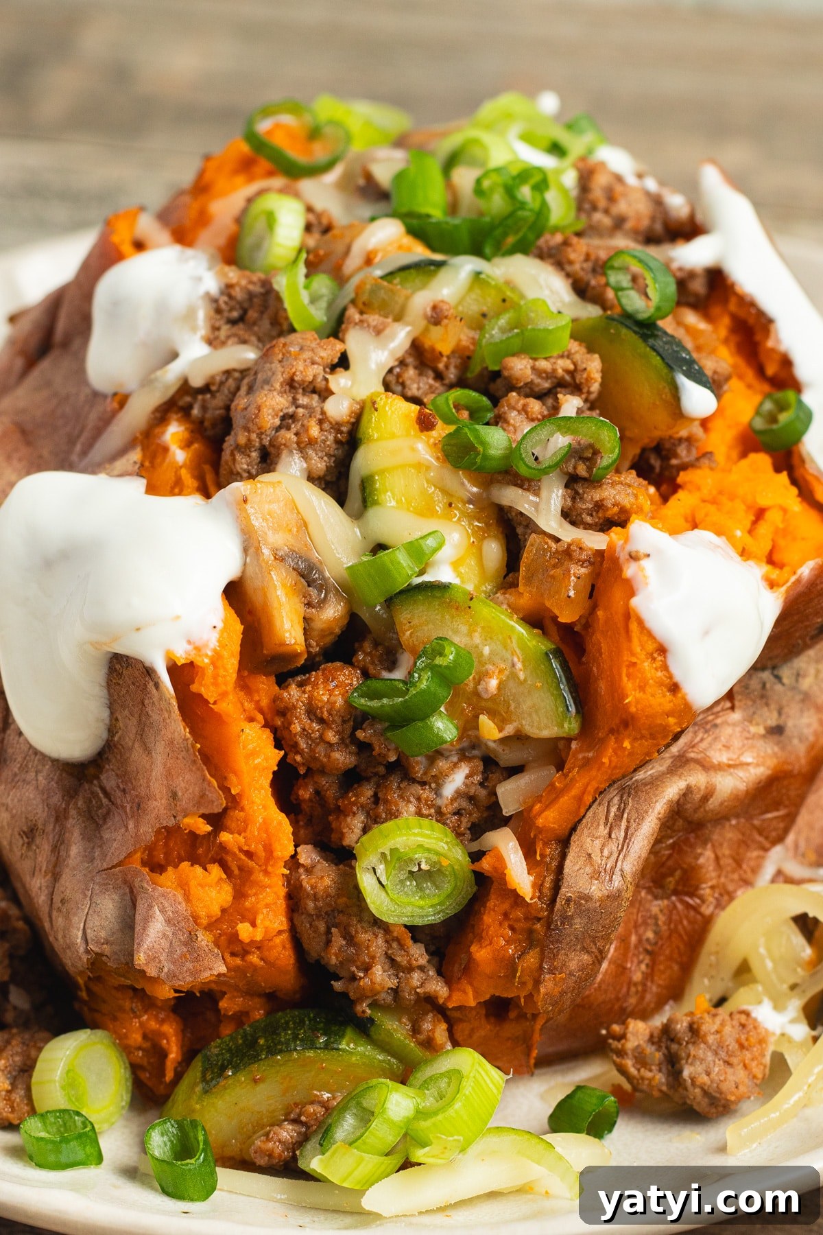 Stuffed Sweet Potatoes with Seasoned Ground Beef and Cheese 2 This is a picture of a stuffed ground beef sweet potato.