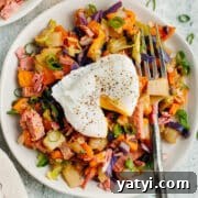 This is a picture of corned beef hash topped with a poached egg.