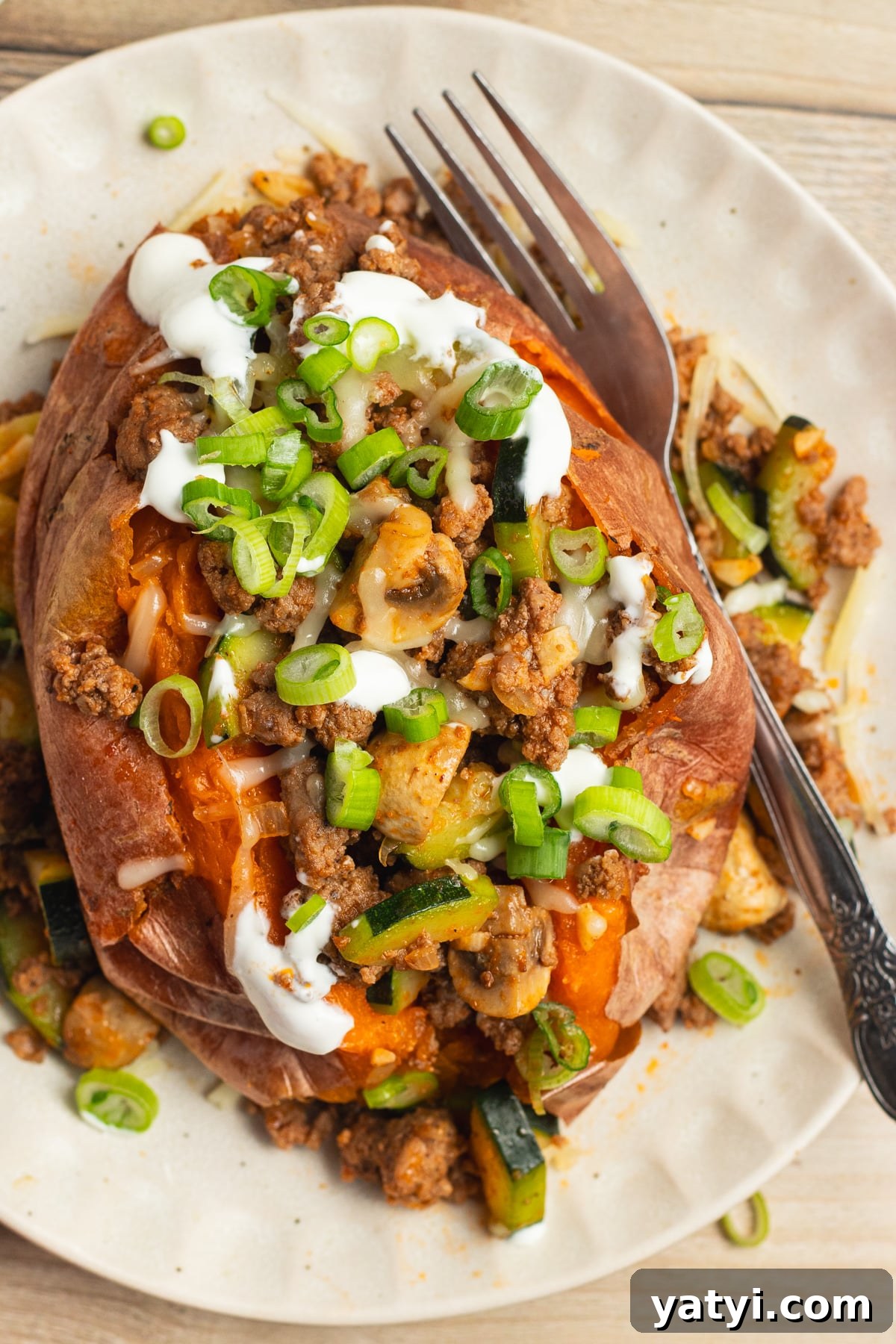 Stuffed Sweet Potatoes with Seasoned Ground Beef and Cheese 8 This is a picture of a stuffed sweet potato.
