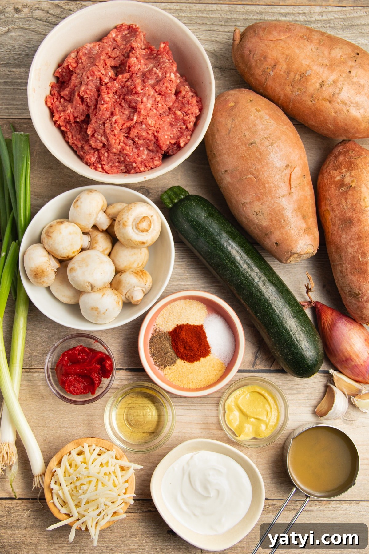 Stuffed Sweet Potatoes with Seasoned Ground Beef and Cheese 3 This is a picture of all the ingredients needed to make this recipe.