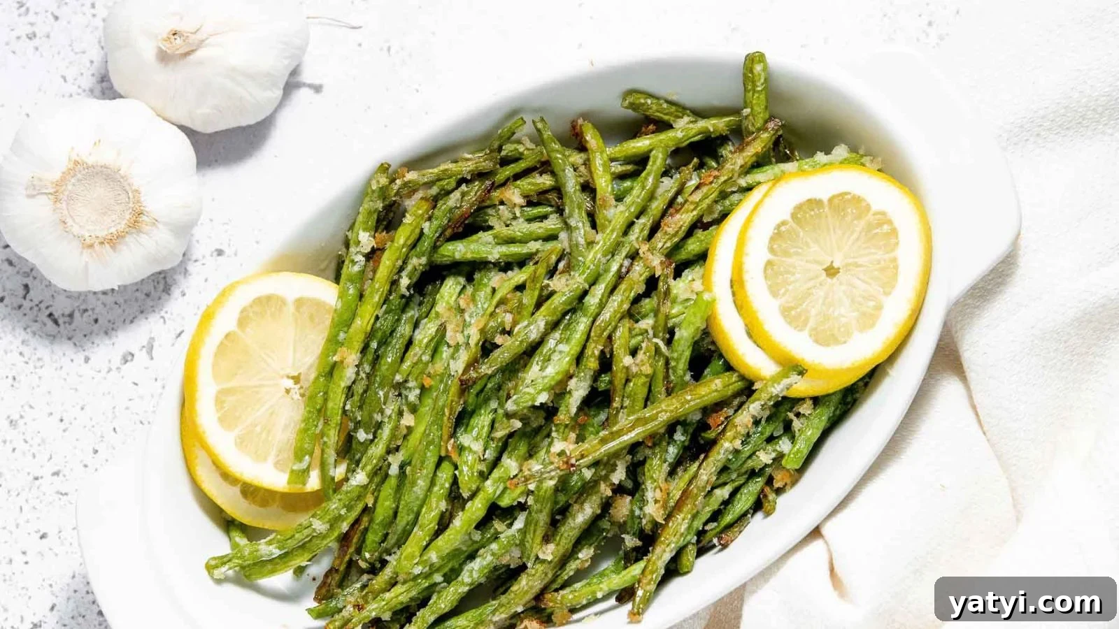19 Holiday Side Dishes to Balance Your Festive Meal 4 Roasted green beans with browned edges and a crisp bite.