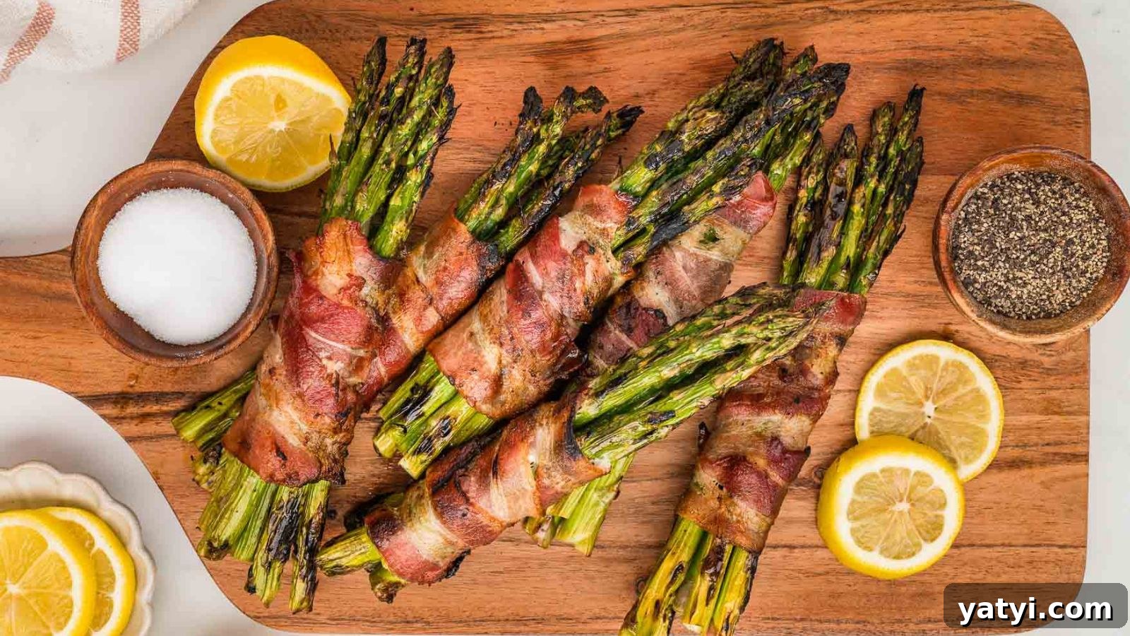 19 Holiday Side Dishes to Balance Your Festive Meal 9 Grilled asparagus wrapped in bacon with charred edges and juicy centers.