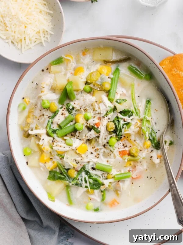Slow Cooker Thai Red Curry with Chicken and Coconut Milk 9 Chicken pot pie soup in a shallow white bowl, served with a biscuit