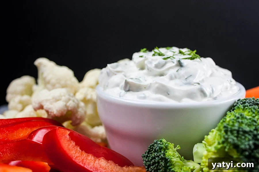 Fresh Herb Veggie Dip Recipe for Parties and Snacks 9 Fresh Herb Vegetable Dip with various vegetables around.